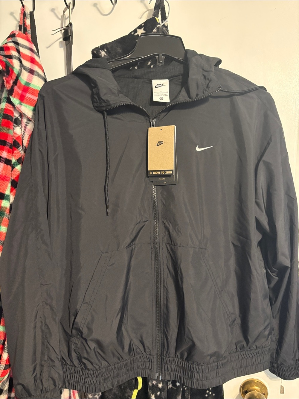 Nike Black Hooded Windbreaker with White Swoosh